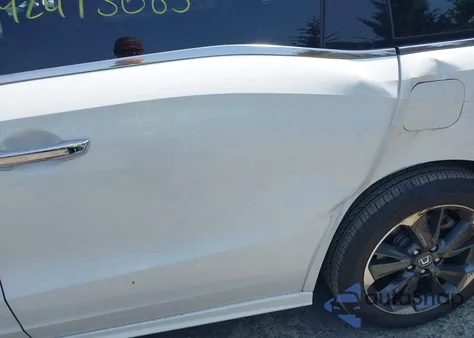 2023 Honda Odyssey Elite z USA, uszkodzony, nr VIN 5FNRL6H90PB021561